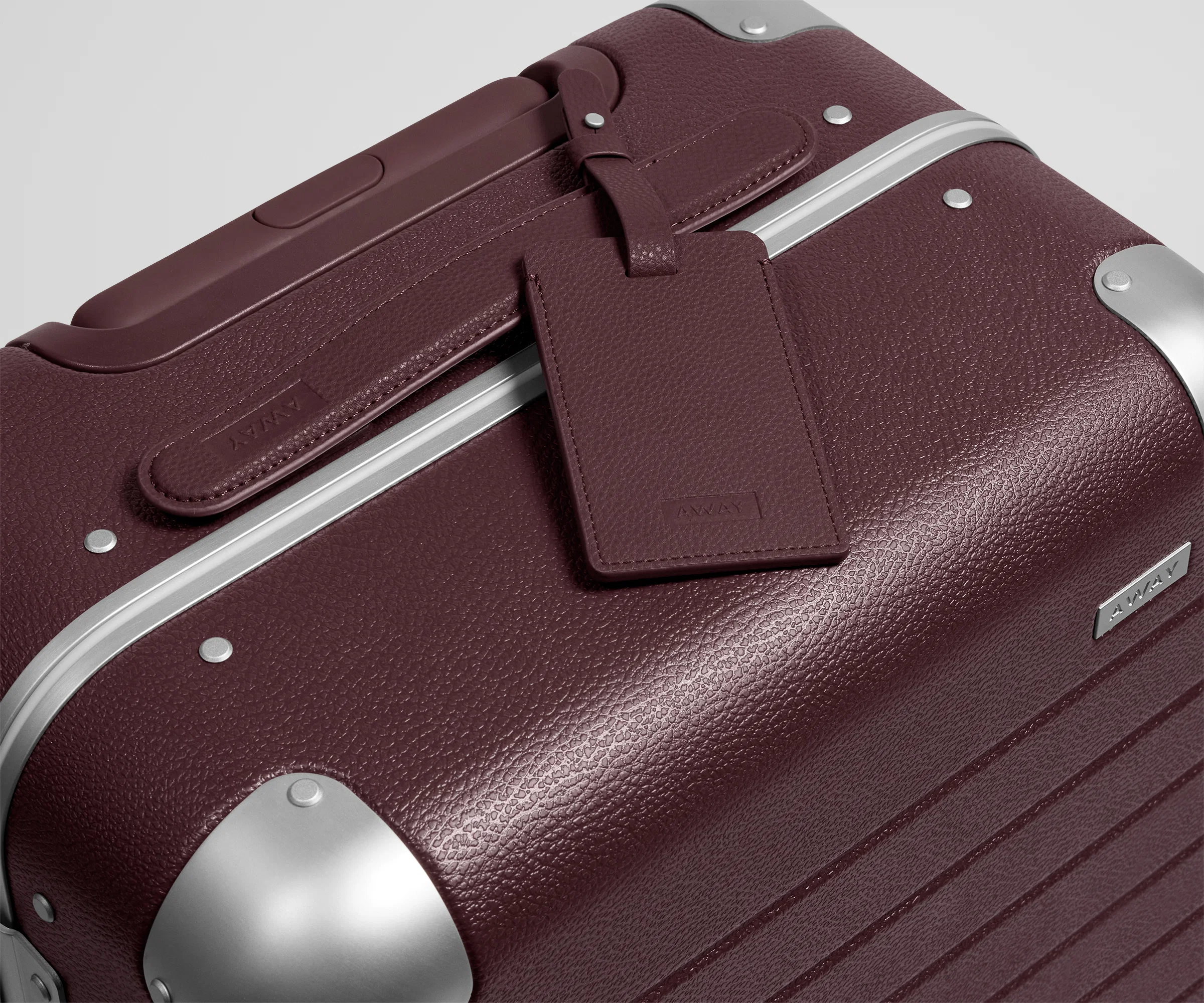 The Aluminum Edge Bigger Carry-On in Oxblood Red - Image 8