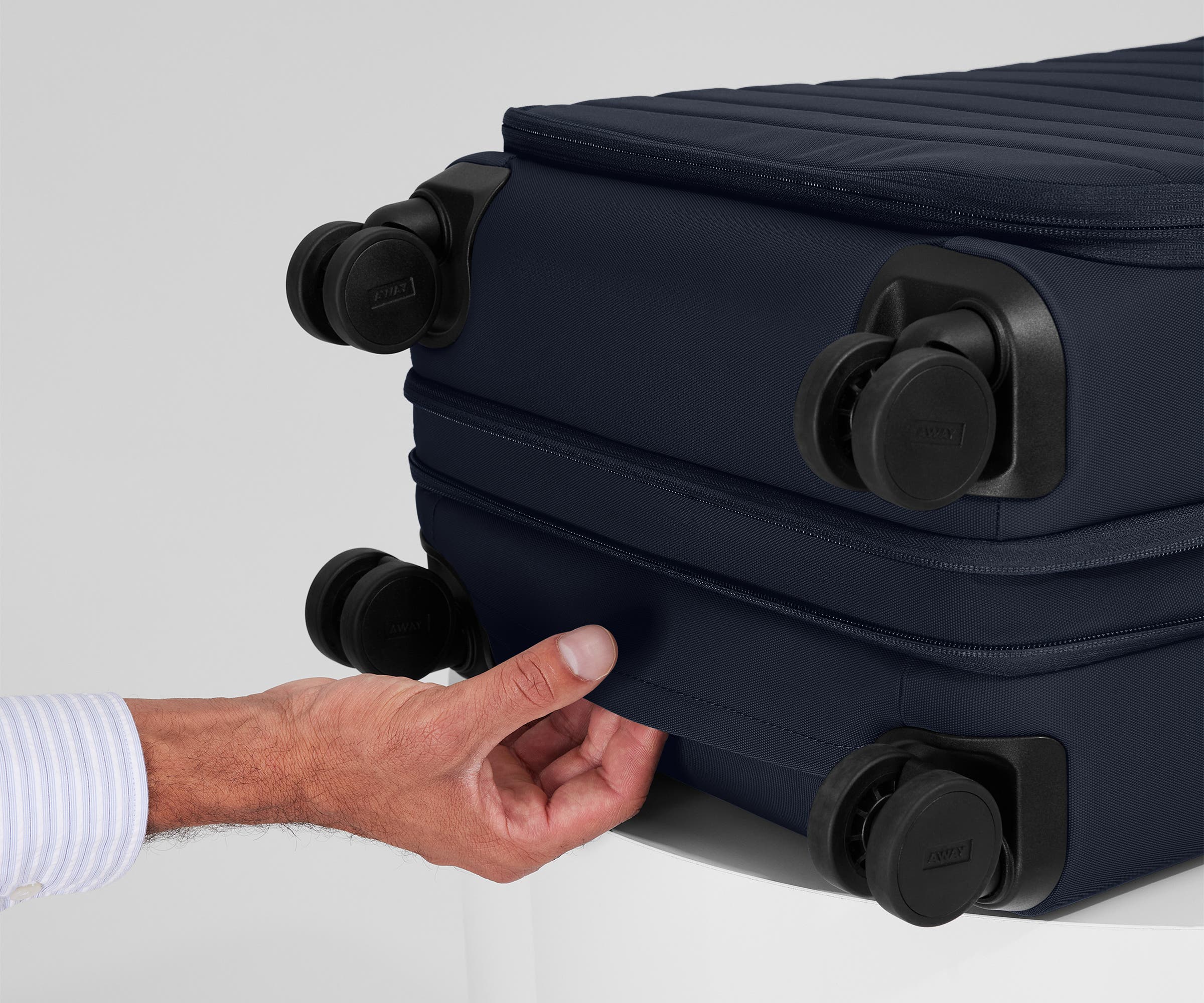 Softside Bigger Carry-On in Navy Blue - Image 9