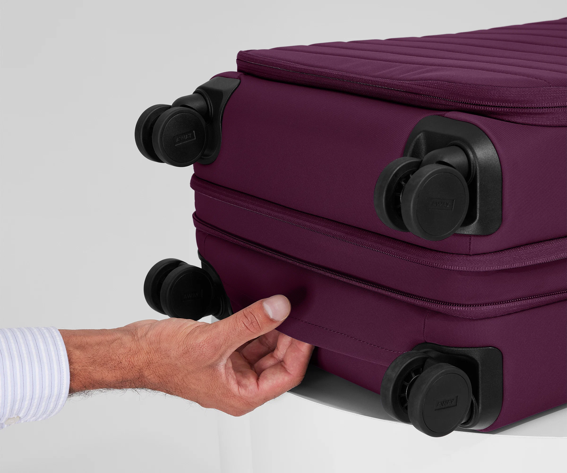 Softside Bigger Carry-On in Plum Purple - Image 8